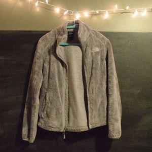 Grey fuzzy north face jacket